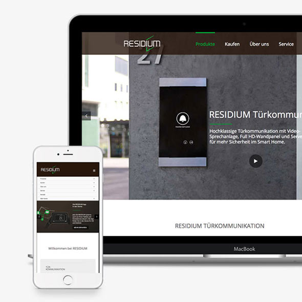 Ein Smartphone und ein iMac zeigen die responsive Website von Residium